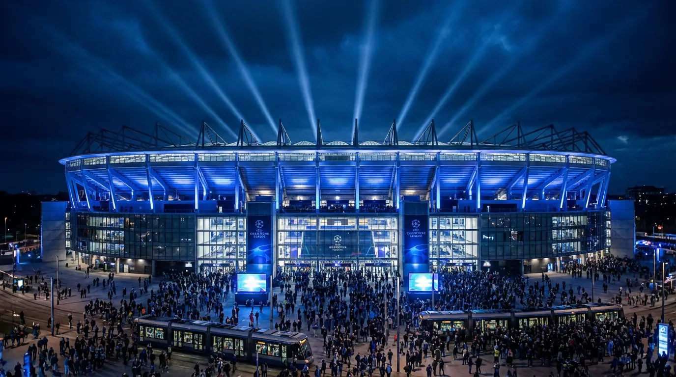 Night view of a European football stadium with Champions League atmosphere and blue lighting